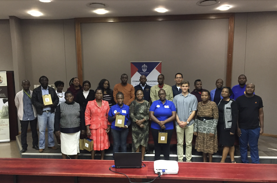 Batten alum Cameron Haddad (Bottom row, fourth from right) and fellow participants of a research symposium and community engagement event at the University of Venda in South Africa. 
