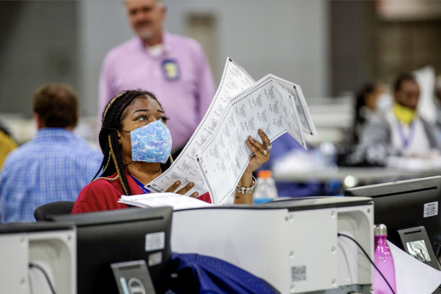 Voting by mail hasn’t given a big advantage to one political party, but Republican rhetoric could change the dynamic for November’s election. ALYSSA POINTER/ATLANTA JOURNAL-CONSTITUTION VIA AP