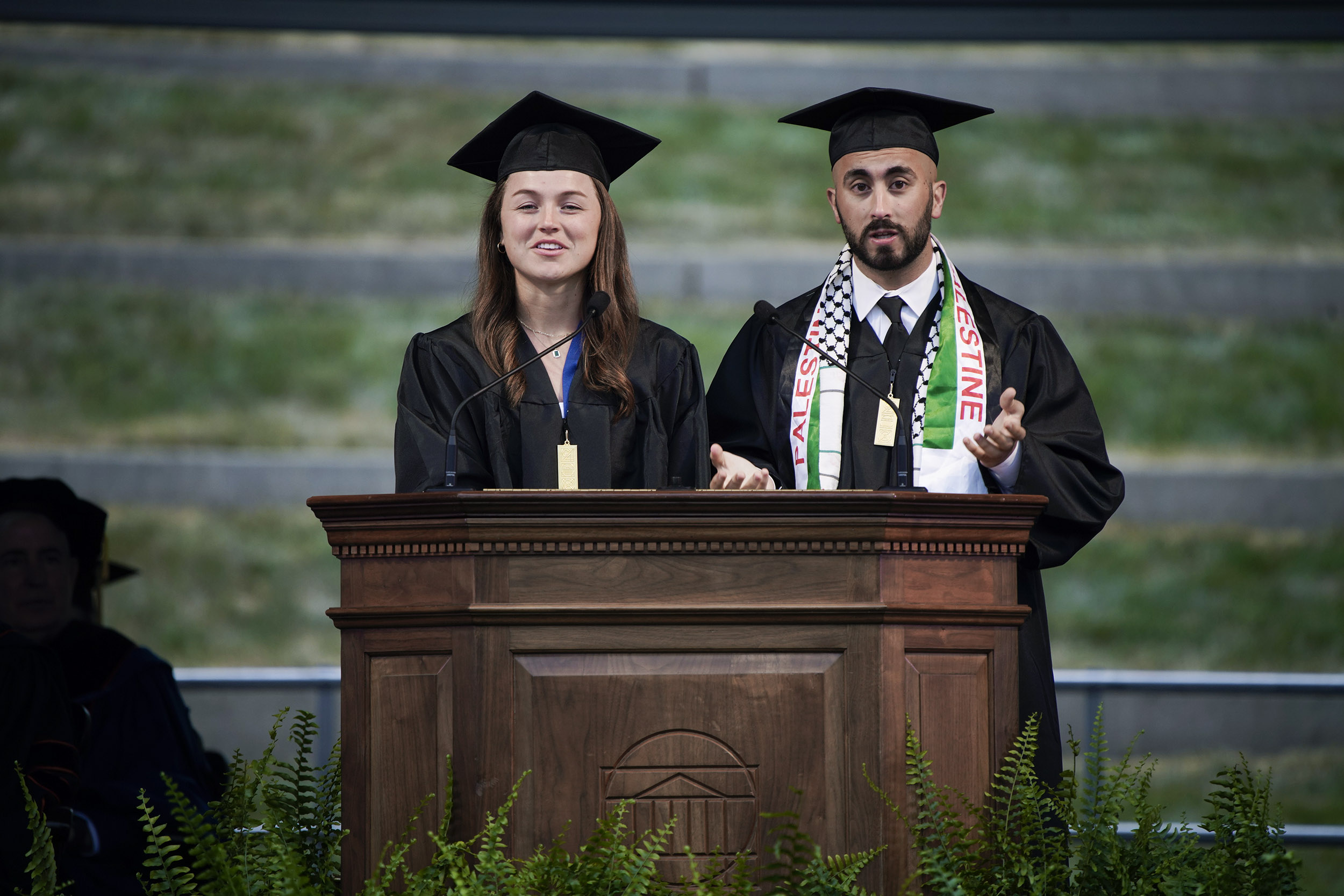 Class of 2020 President Omar Elhaj, right, and Vice President Ginny Brooks took the class on a tour of the last year â things they missed, things they learned, things they questioned. (Photo by Sanjay Suchak, University Communications)